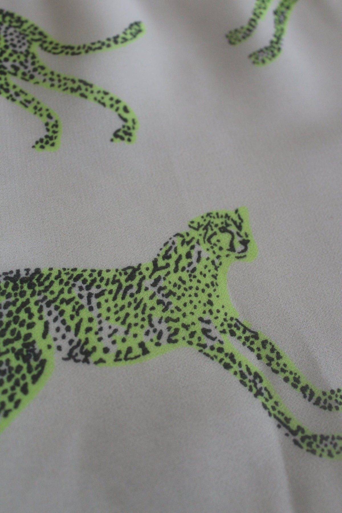 Knee- length animal printed tunic U fashion