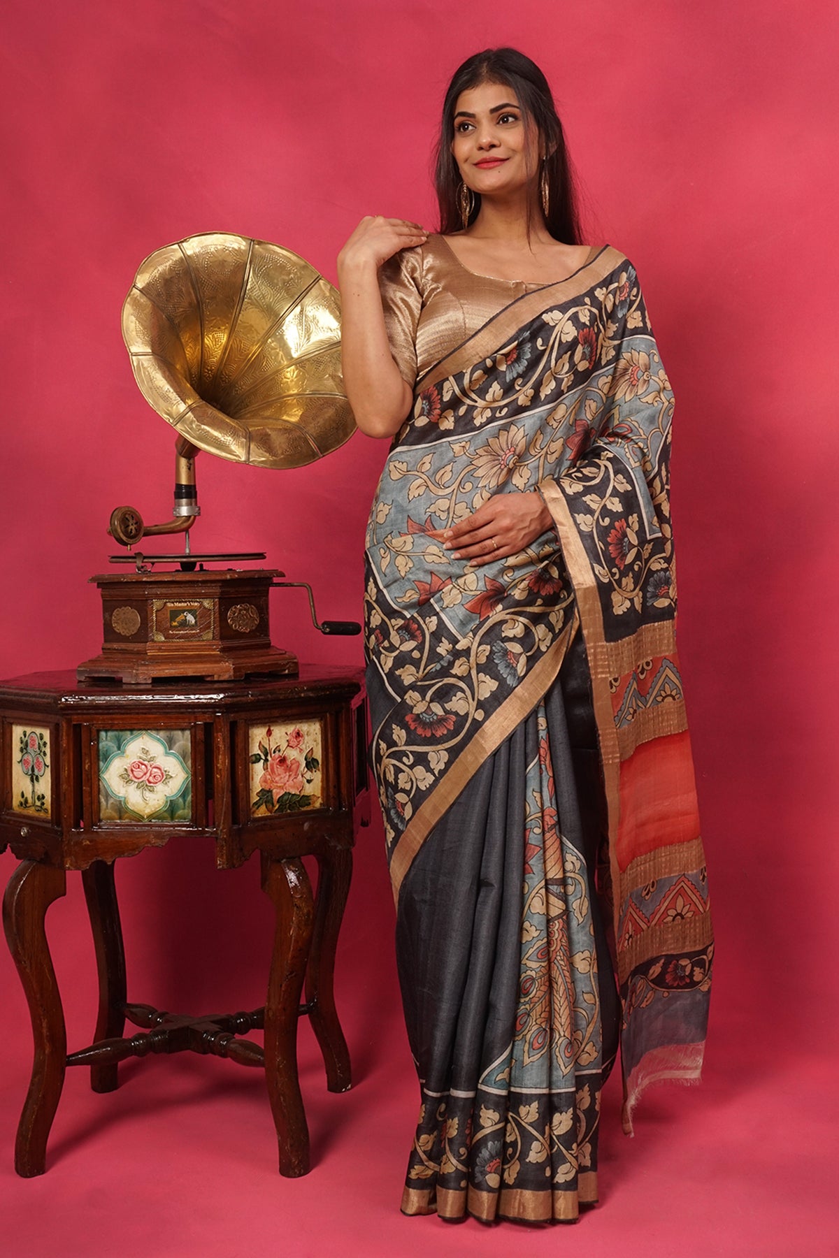 Gray and black tussar silk in hand painted floral with gold border.