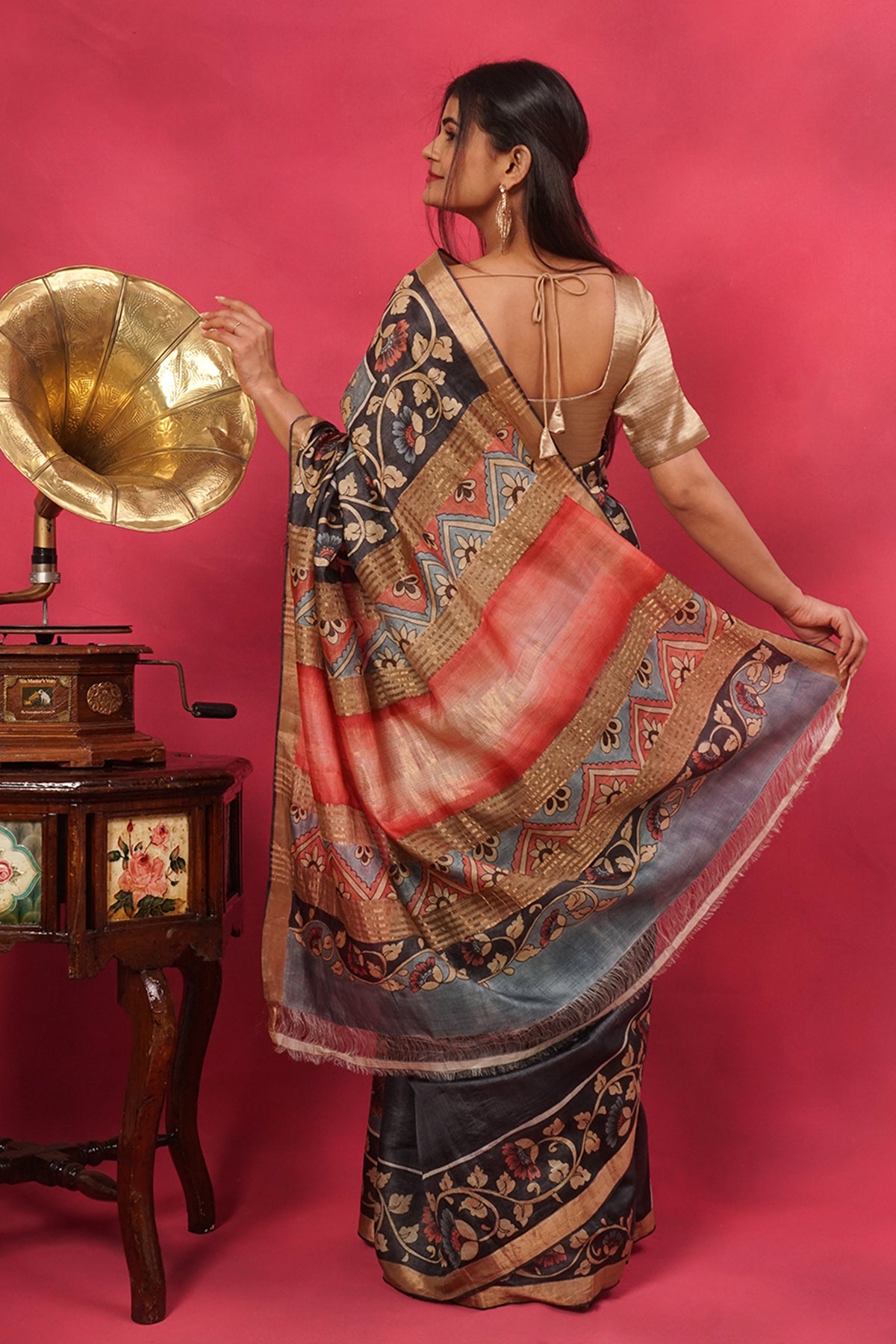Gray and black tussar silk in hand painted floral with gold border.