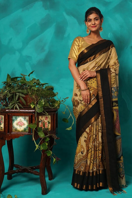 Beige hand kalamkari painted silk saree.