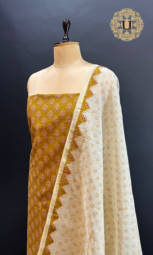 MUSTARD BLOCK PTD APPLIQUE WORK UN-STICHED SUIT.