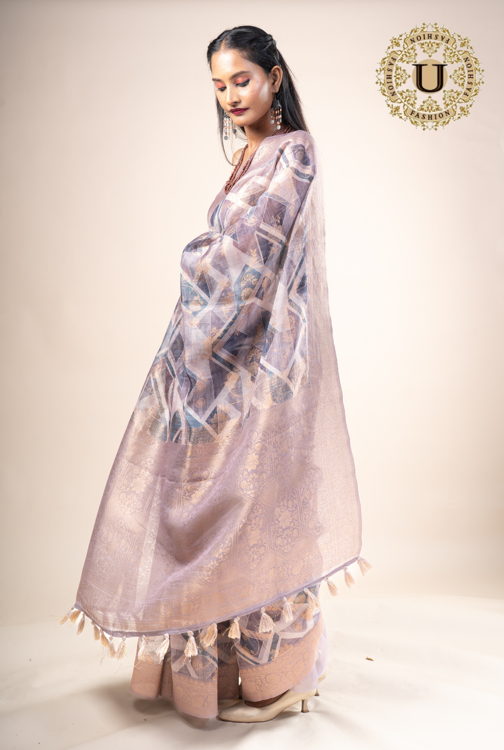 Beige and purple printed semi organza Saree