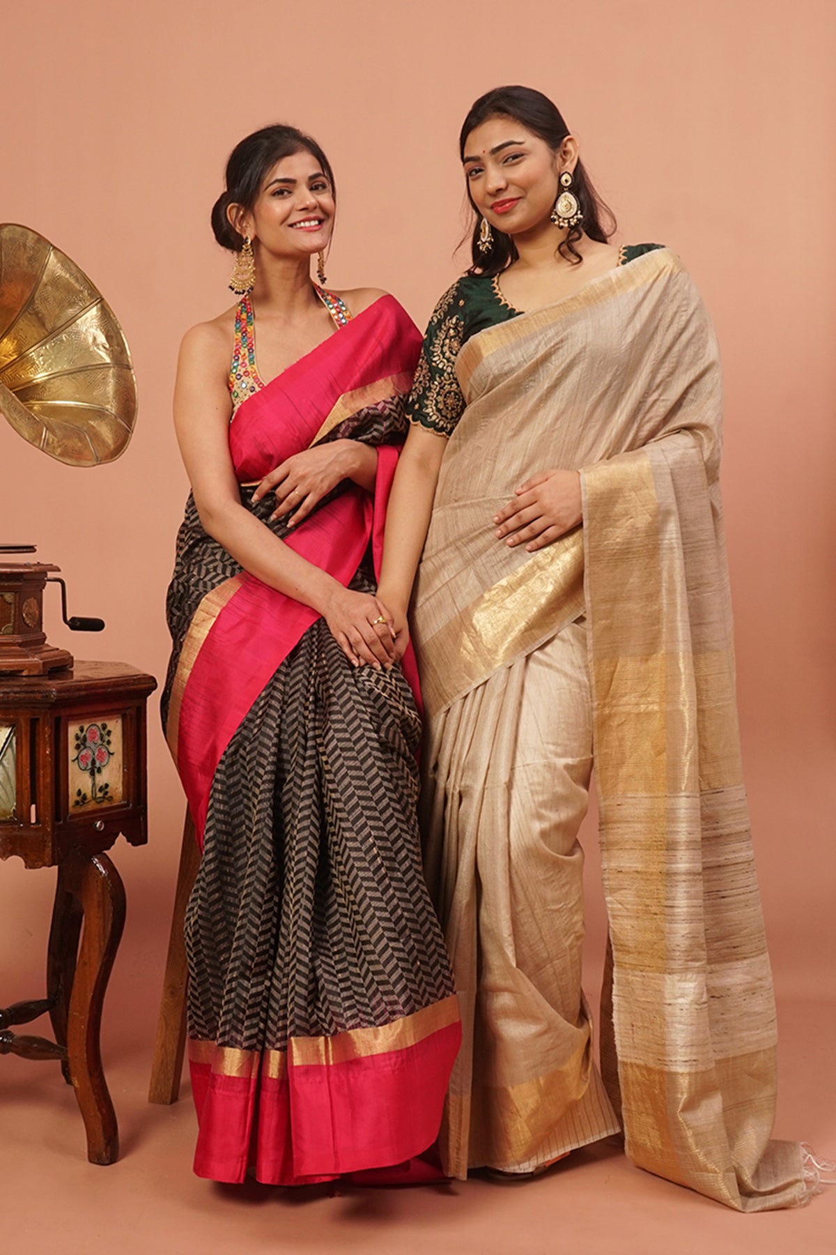 Black woven handloom silk with pink and gold border.