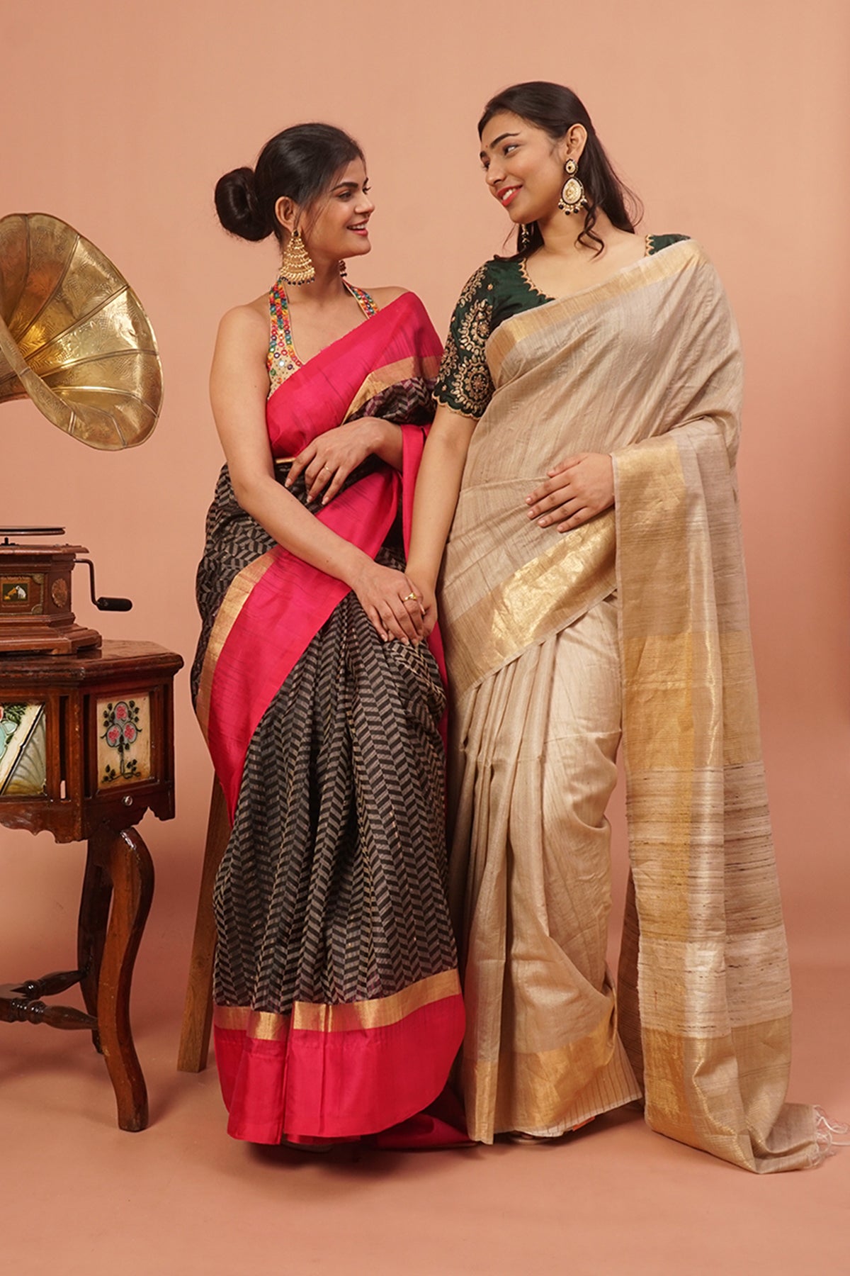 Black woven handloom silk with pink and gold border.