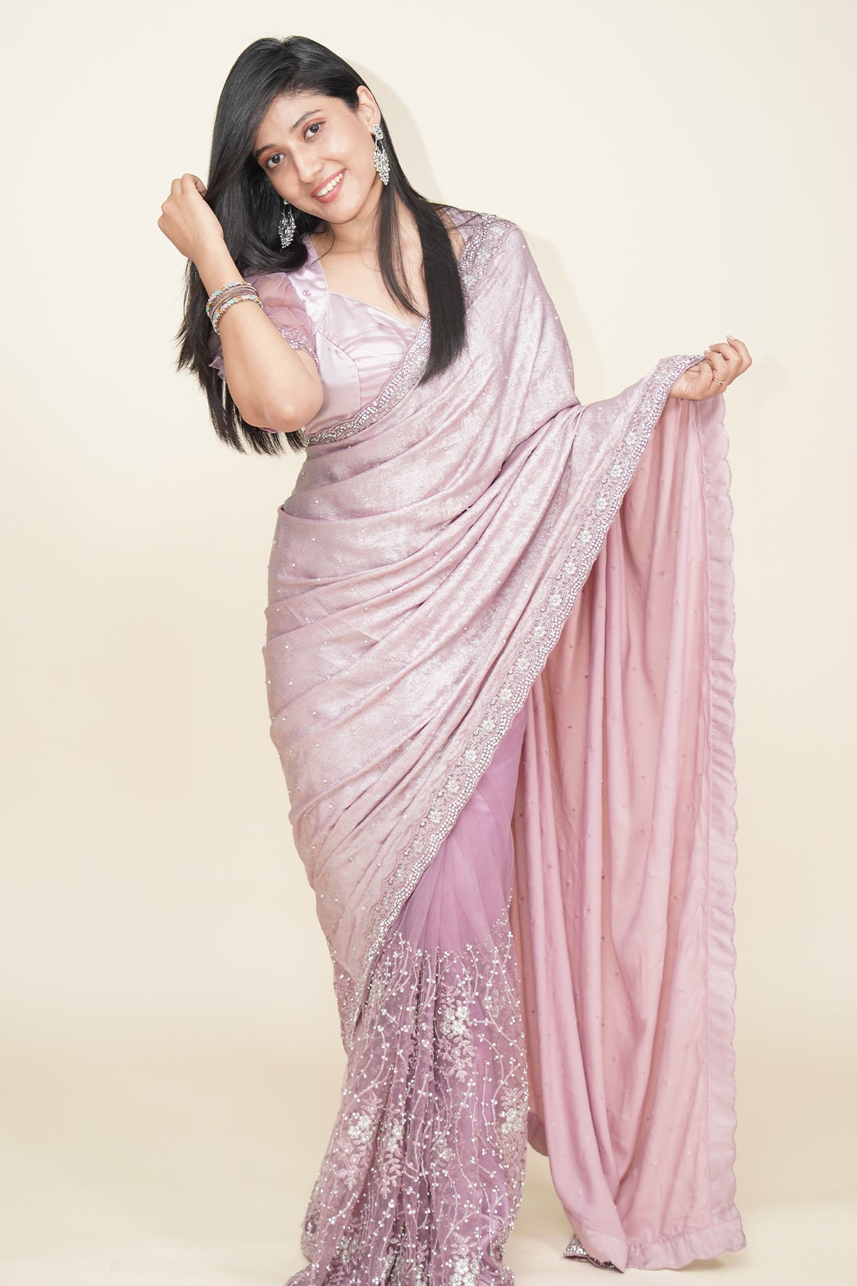 Purple and Mauve net and velvet embroidered saree