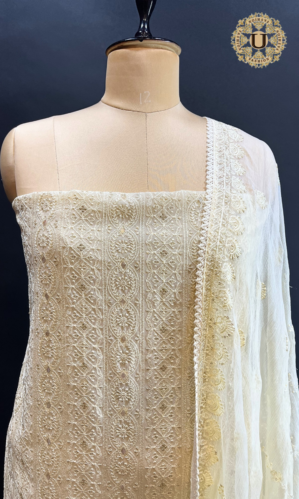 Light Yellow Self Embroidered Georgette Un Stitched Suit.