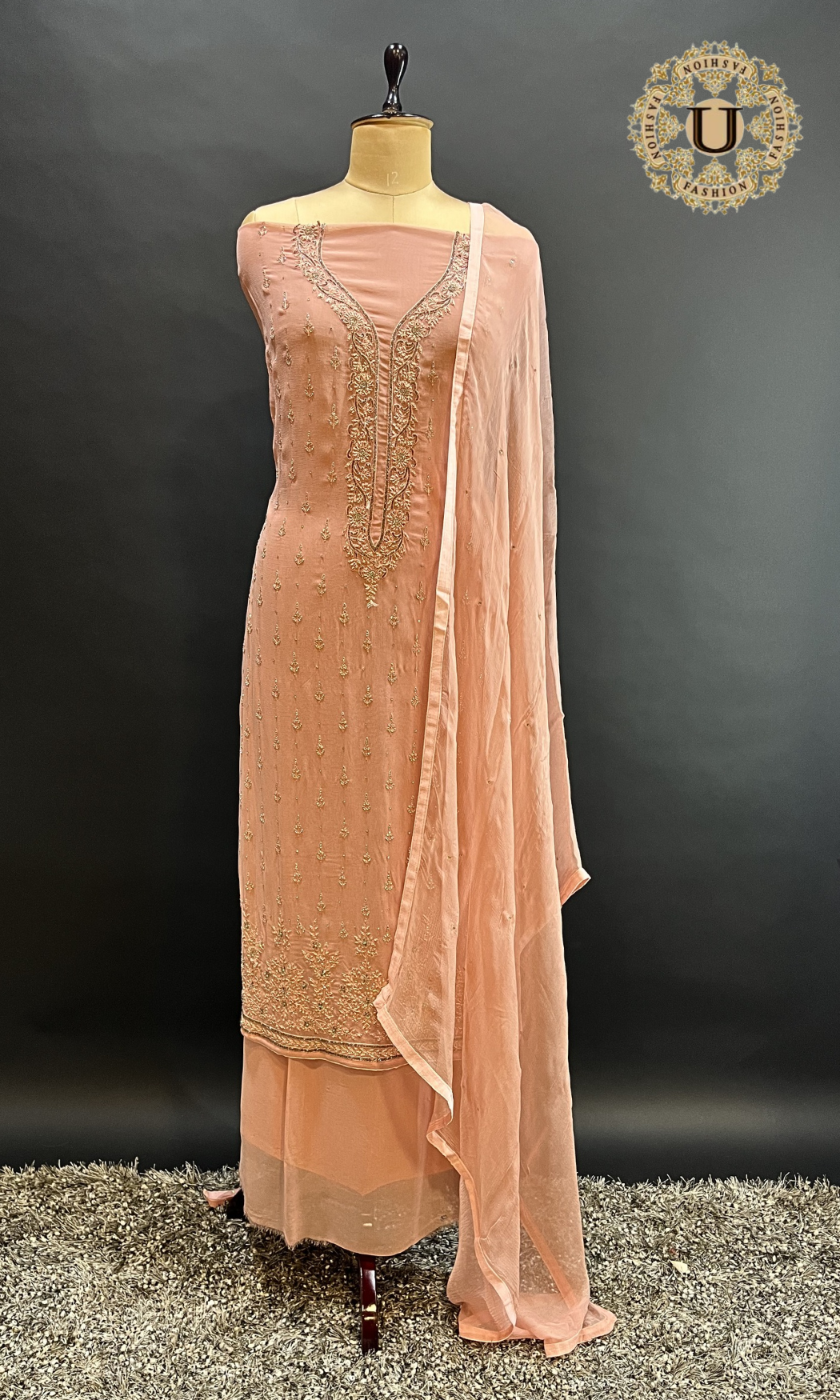 Peach Hand Embroidered crape Un Stiched Suit.