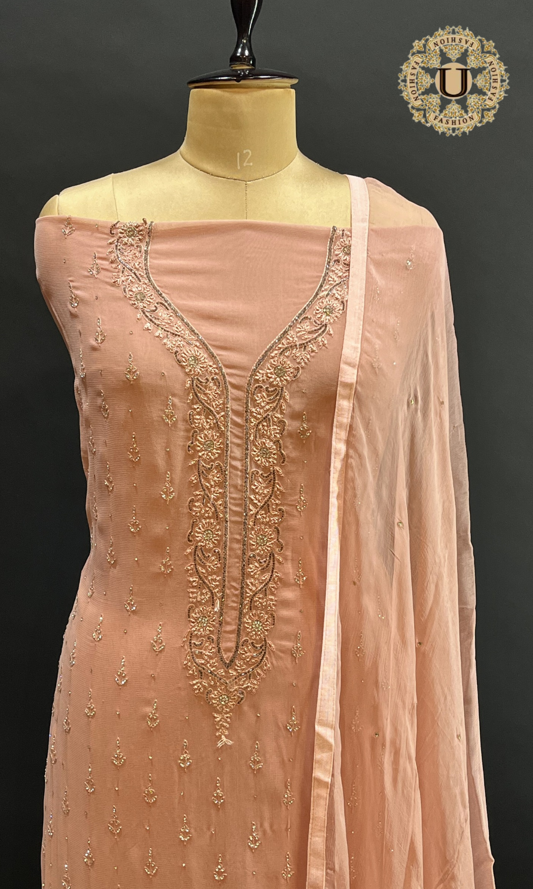 Peach Hand Embroidered crape Un Stiched Suit.