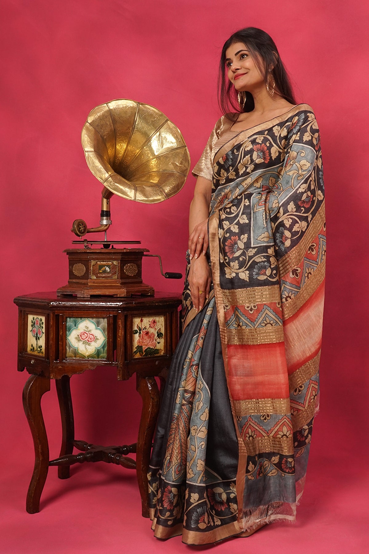 Gray and black tussar silk in hand painted floral with gold border.