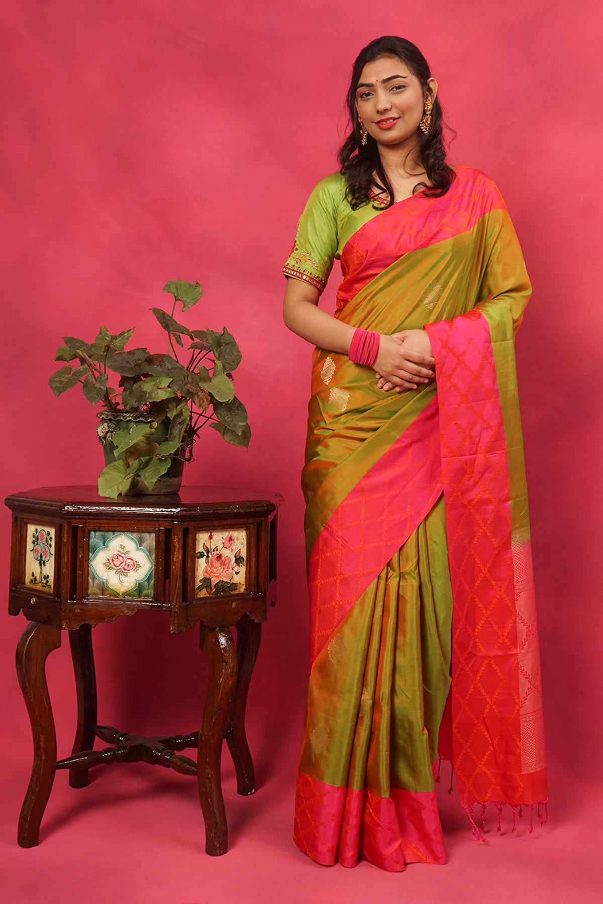 Pure silk saree in mehendi green with pink border and zari pallu
