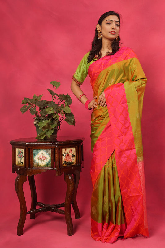 Pure silk saree in mehendi green with pink border and zari pallu