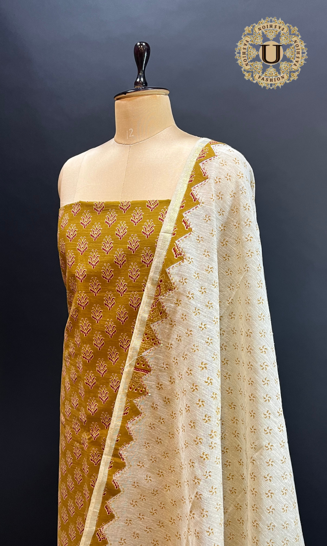 MUSTARD BLOCK PTD APPLIQUE WORK UN-STICHED SUIT.